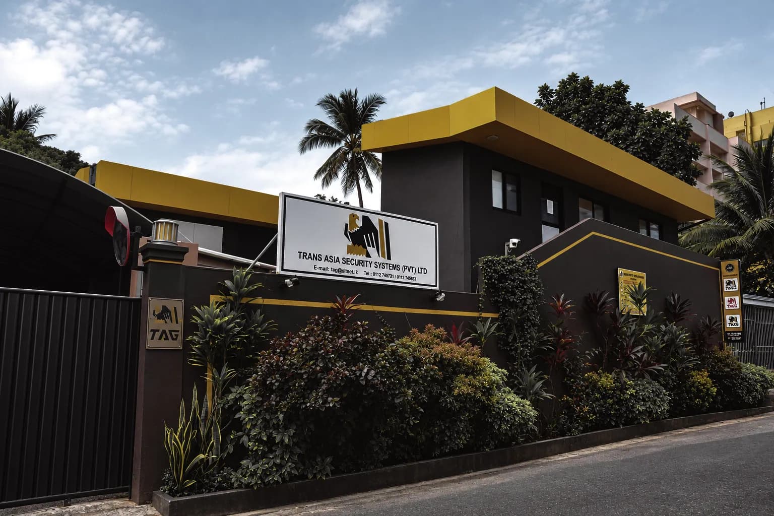 Trans Asia Security Systems head office in Dehiwala, with the company sign on the boundary wall